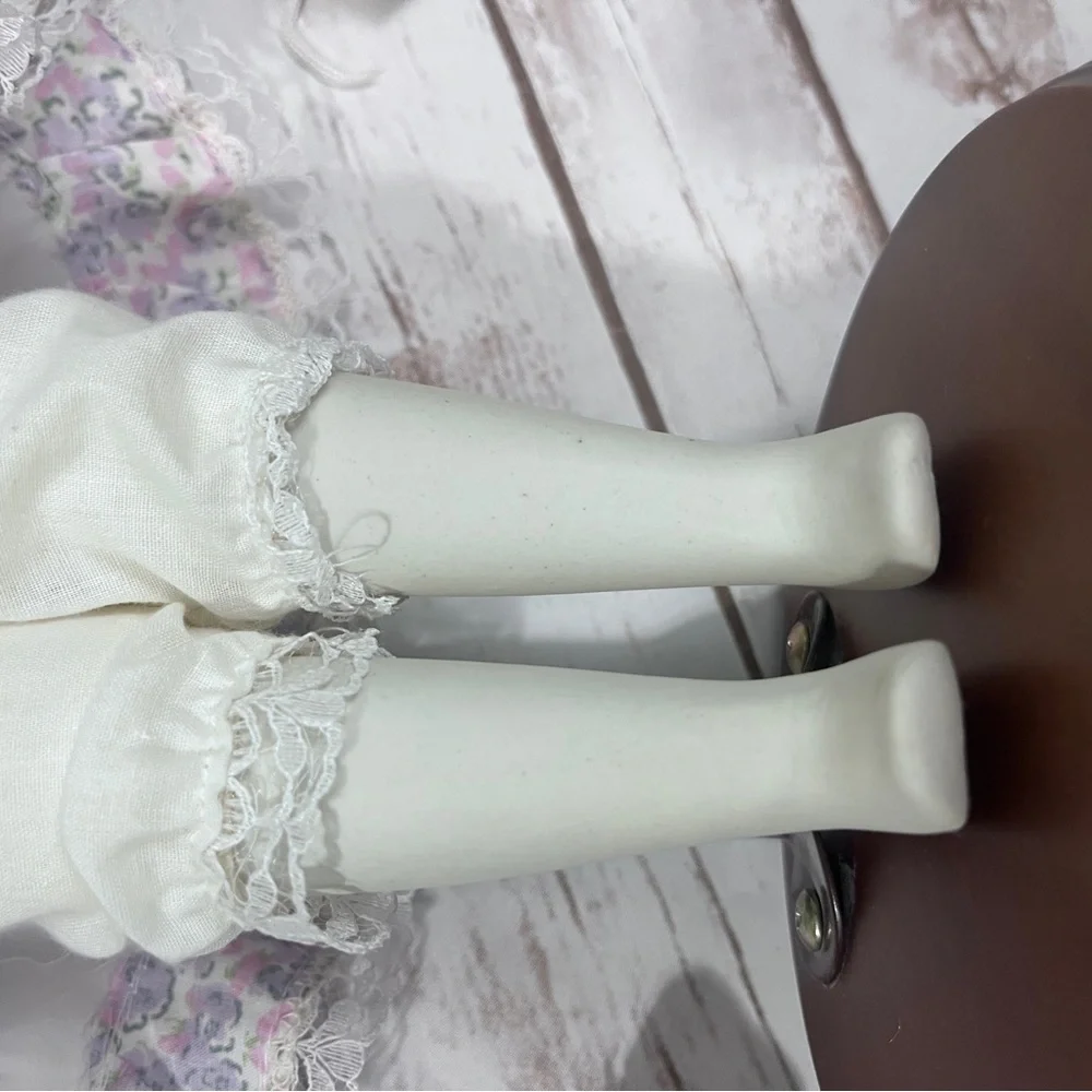Porcelain Doll with purple floral dress and‎ Hat vintage